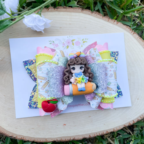 Rainbow Pencil Girl on Books Bow