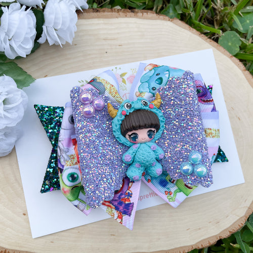Girl in Blue Monster Costume Ribbon Bow