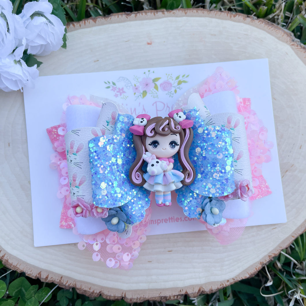 Girl Holding Bunny with Tulle