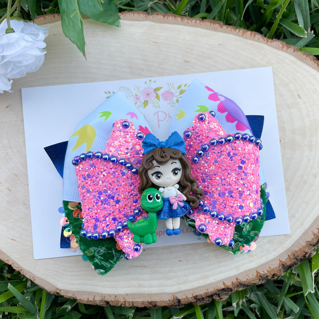 Girl with Dinosaur Ribbon Bow