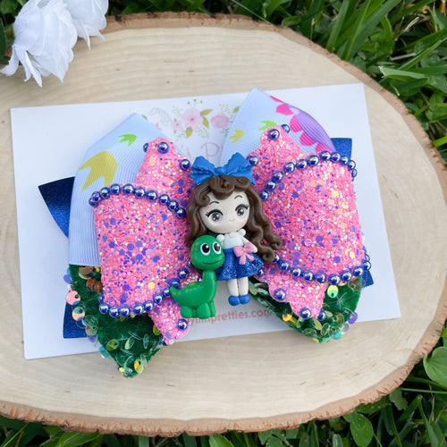 Girl with Dinosaur Ribbon Bow
